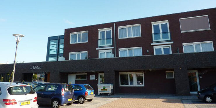 Het Tuinhuis in Woudenberg, appartementengebouw met de ontmoetingsruimte op de begane grond
